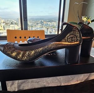 Chanel block heel distressed black and gold CC scrunch pumps